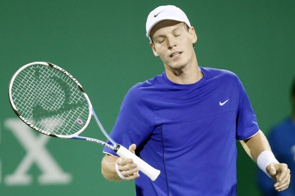 Tomáš Berdych v utkání s Gillesem Simonem.