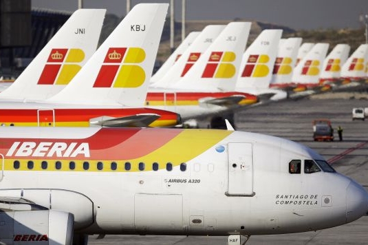 Společnost Iberia se sloučí s britskou společností British Airways.