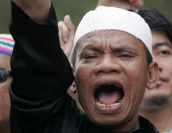 Alláh je jen náš! Muslim protestuje, Kuala Lumpur, 8. ledna.
