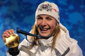 Anastasia Kuzminová se zlatou olympijskou medailí. Anastasia Kuzminová se zlatou olympijskou medailí.