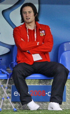Zraněn&yacute; Tom&aacute;&scaron; Rosick&yacute; na lačice n&aacute;rodn&iacute;ho t&yacute;mu v Ženevě.