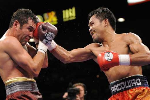 Manny Pacquiao právě zasáhl De La Hoyu.