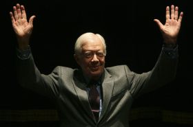 Vítání na Americké univerzitě v Káhiře. Carterova cesta regionem.
