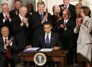 Barack Obama podepsal Bushem vetovaný zákon o pojištění pro děti.