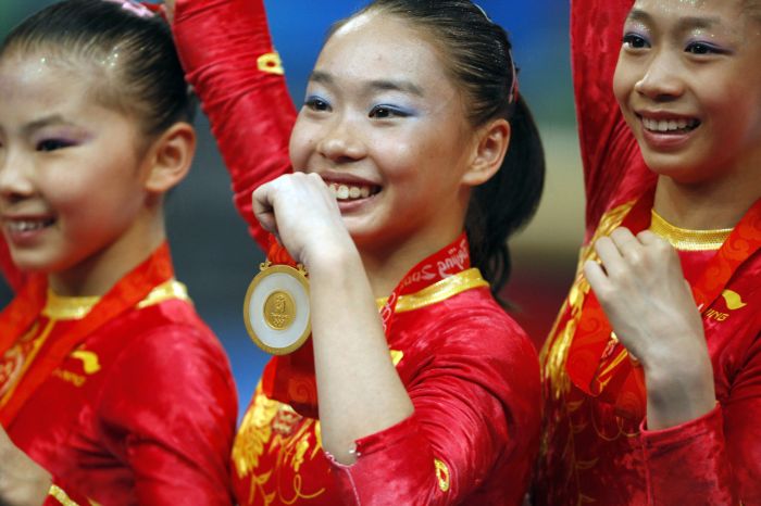Čínské gymnastky na olympiádě v Pekingu - ilustrační foto.