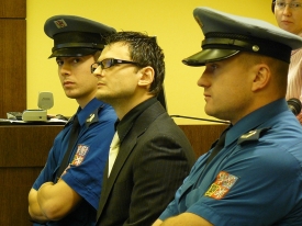 Dmitrij Nikitin na lavici obžalovaných.