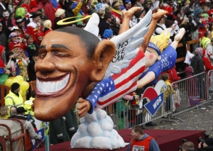 Barack Obama jako anděl na karnevalu v Duesseldorfu.