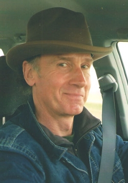 Autor Zaříkávače koní Nicholas Evans.