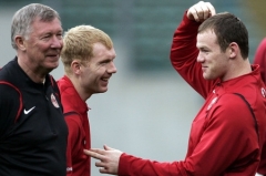 Trenér Alex Ferguson (vlevo) se svými svěřenci