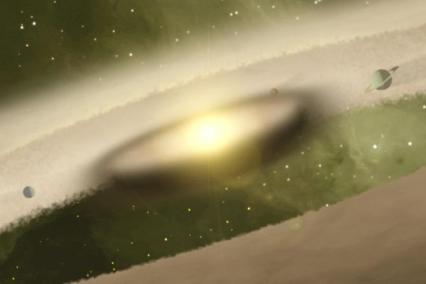 Umělecká představa mladé hvězdy se vznikajícím planetárním systémem.