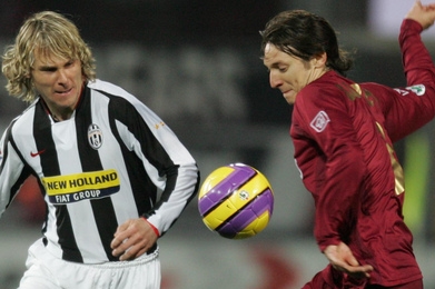 Pavel Nedvěd (vlevo) v utkání proti Reggině.