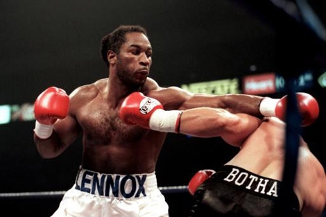 Legendární boxer Lenox Lewis (vlevo).