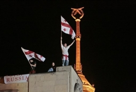 Gruzínci protestují proti ruské intervenci.