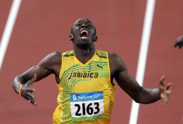 Usain Bolt překonal v Pekingu rekordy na 100, 200 a 4x100 metrů