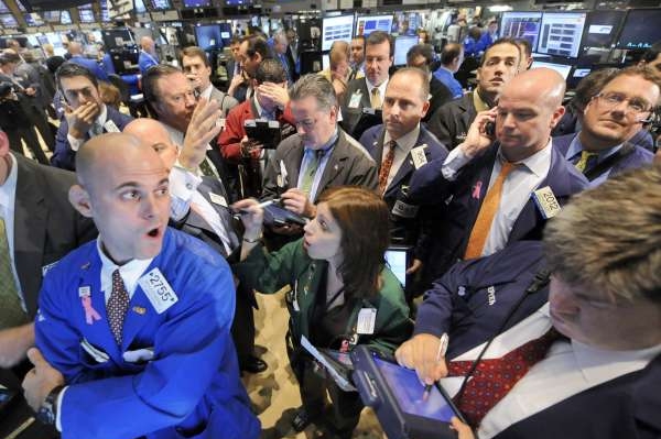 Kyselé tváře na Wall Streetu = úsměvy na tvářích komunistů.